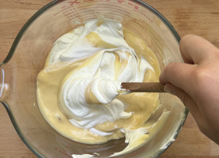 Mixing of sour cream and cream of chicken soup concentrate.