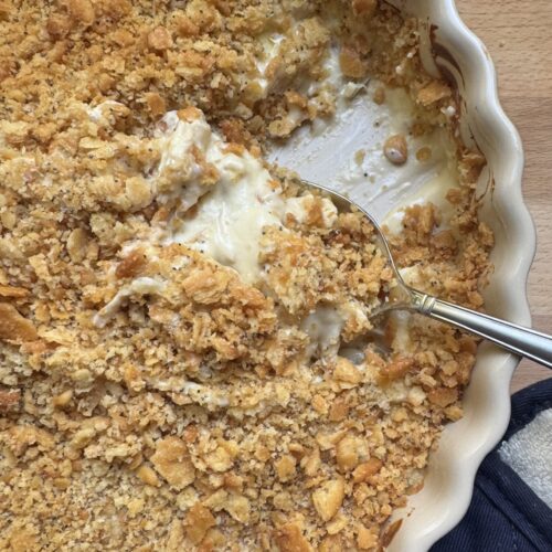 Finished casserole with serving spoon.