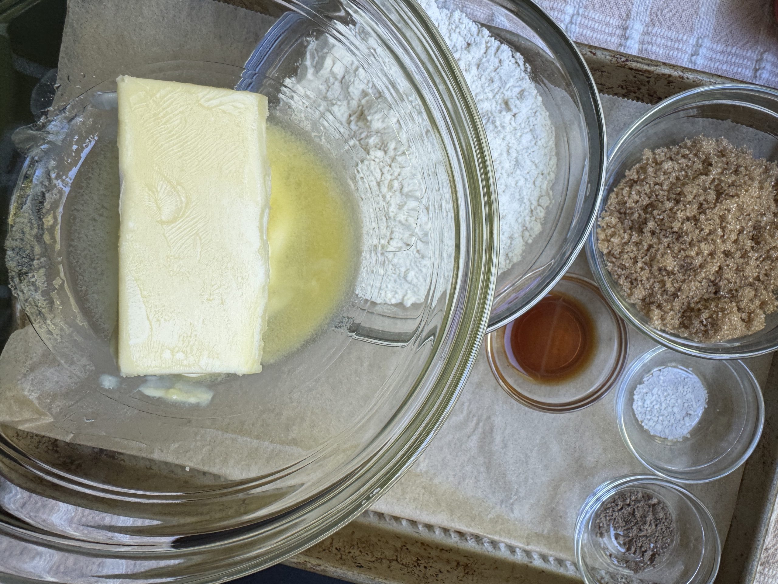 Ingredients for Crumble topping: semi-melted butter, flour, brown sugar, vanilla, cardamom, salt.