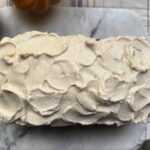Brown Butter Cream Cheese Frosting on a Pumpkin Bread loaf.