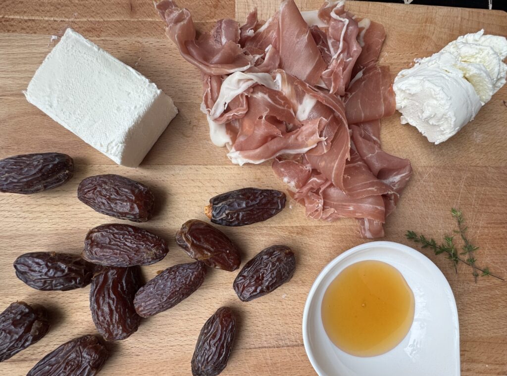 Ingredients: dates, cream cheese, goat cheese (chevre), prosciutto, thyme, hot honey.
