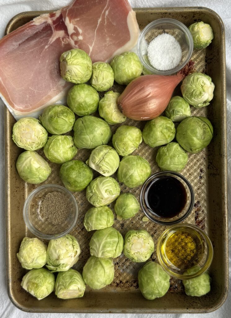 Ingredients for this recipe: Brussels sprouts, prosciutto, shallot, salt, pepper, olive oil, and aged vinegar.