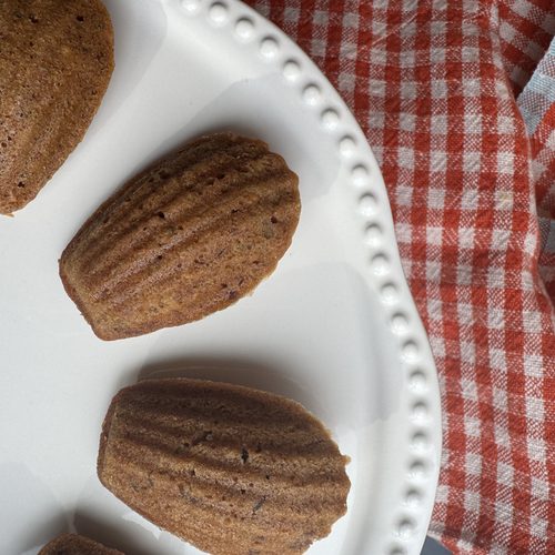 brown butter carrot cake madeleines on serving plate