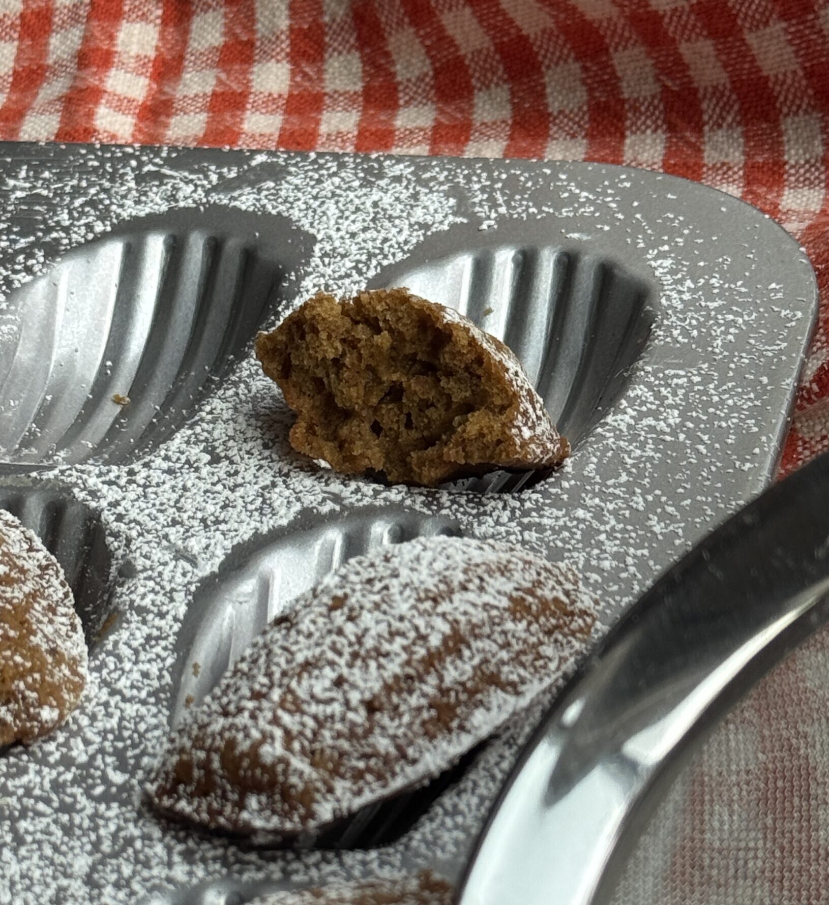 Inner crumb of a freshly baked Brown Butter Carrot Cake Madeleine.