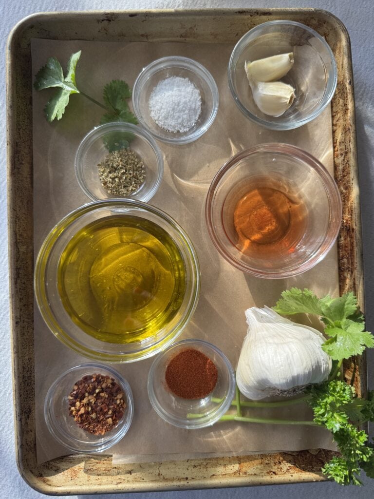 Ingredients for Cilantro Chimichurri organized on a sheet pan