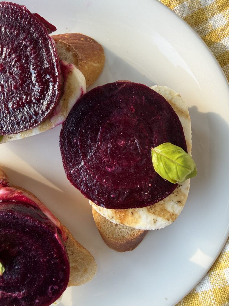 Roasted beet crostini with mozzarella as serving example